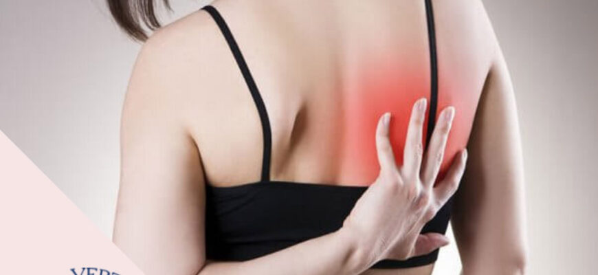 Пекучий біль під правою лопаткою: причини, симптоми та лікування